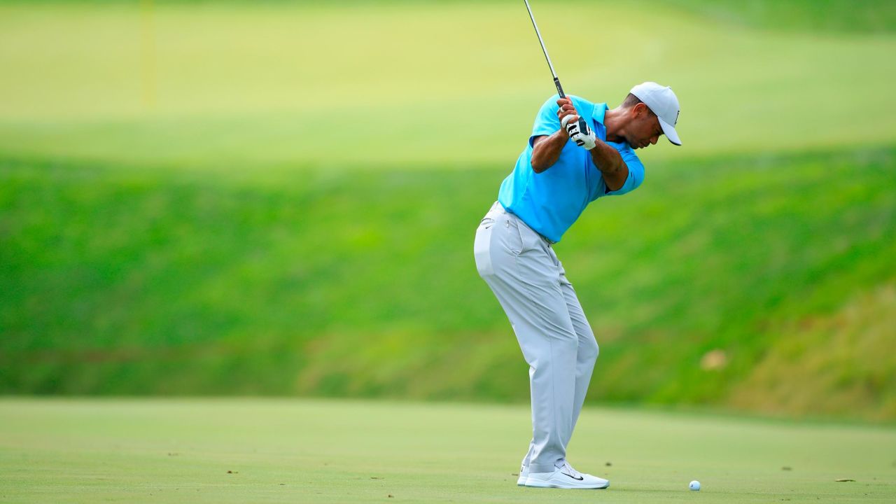 Woods plays his third shot on the 11th hole during the first round of The Memorial Tournament.