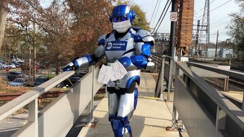 The MTA-North Railroad's mascot,  Metro-Man, was spotted handing out free masks to commuters this week. MTA-North now requires riders to wear masks on trains. 