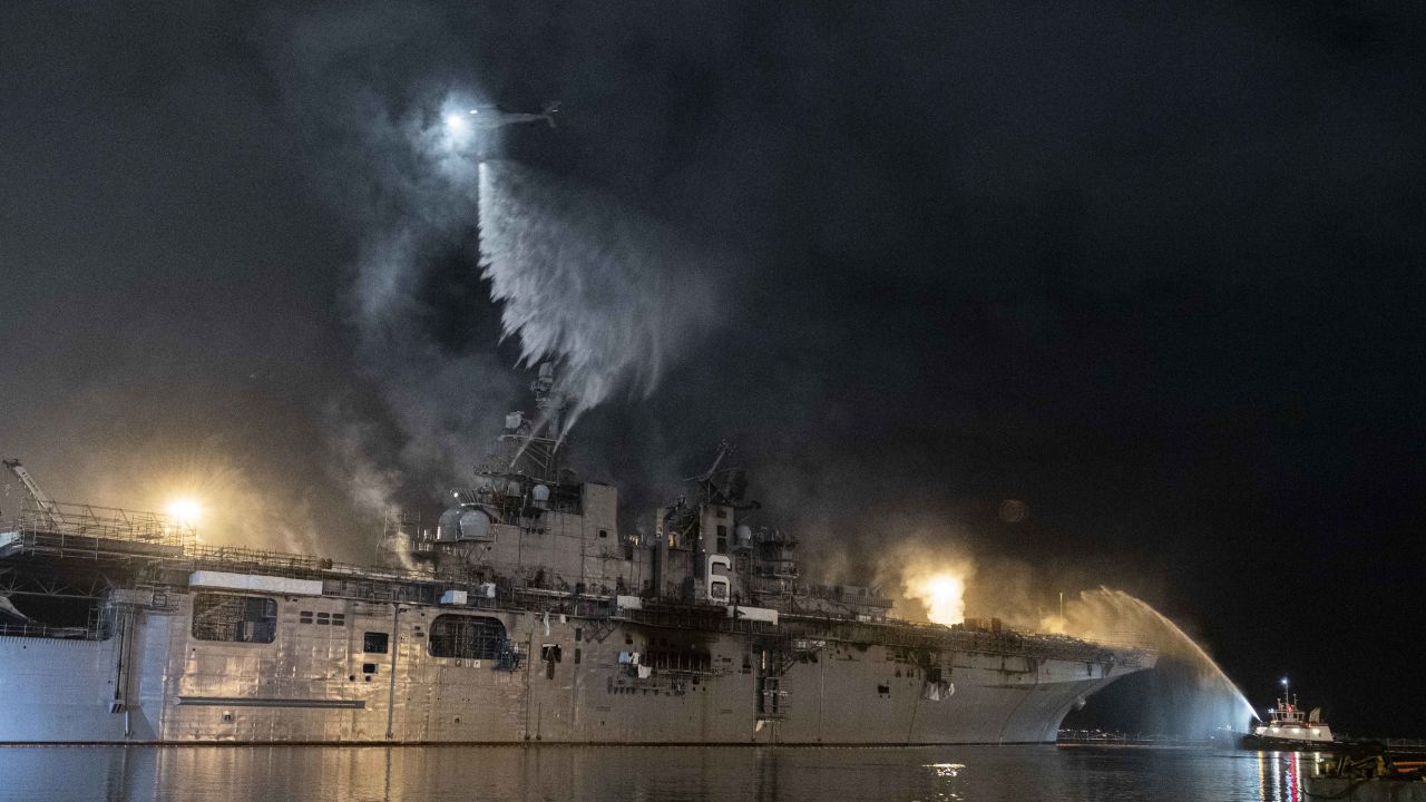A US Navy helicopter combats a fire aboard the amphibious assault ship USS Bonhomme Richard on July 14.