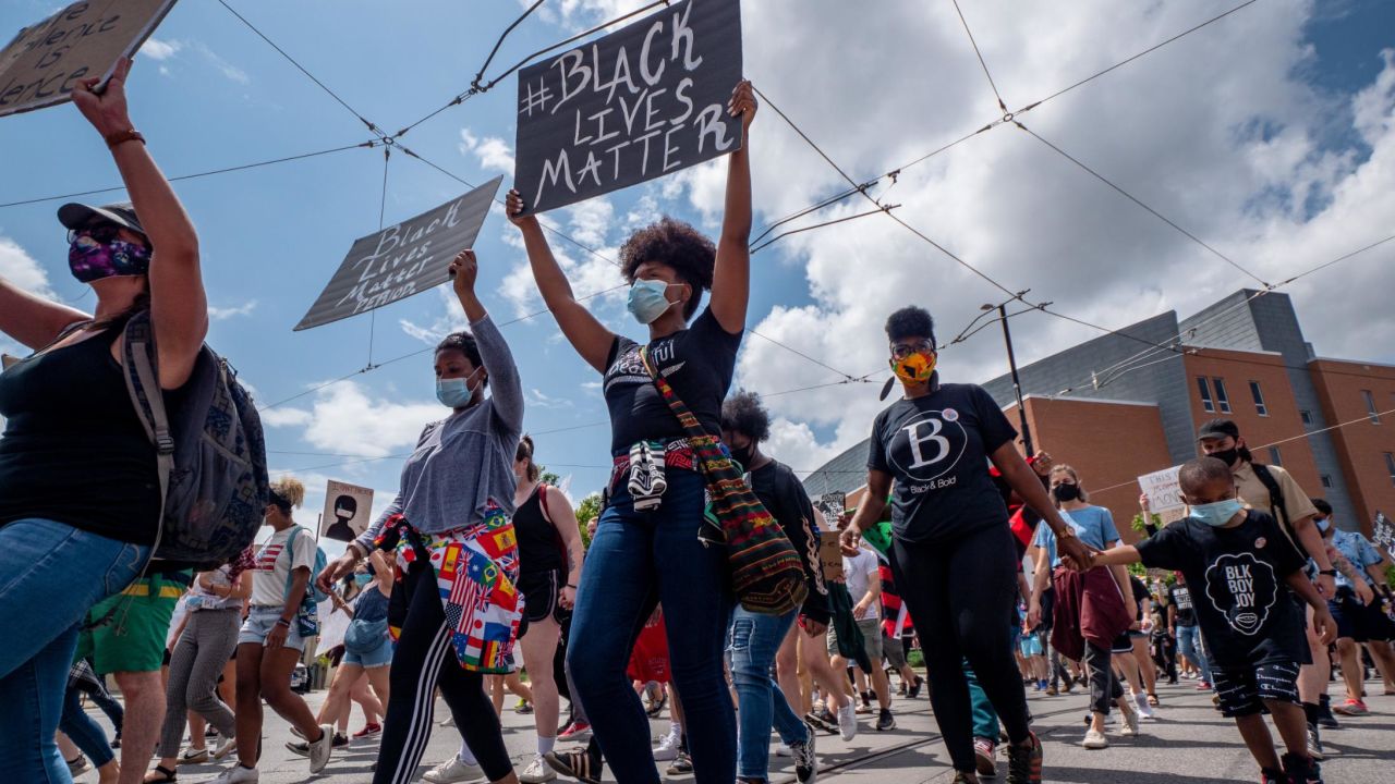 Protesters march during a Black Lives Matter demonstration for racial justice.