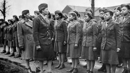 A US, major of Women's Army Corps inspects newly-arrived Black WACs troops at a temporary post in England (February 1945). (Photo by Photo12/UIG/Getty Images)