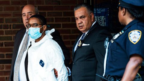 Tyrese Haspil, 21, is escorted by NYPD detectives on Friday.