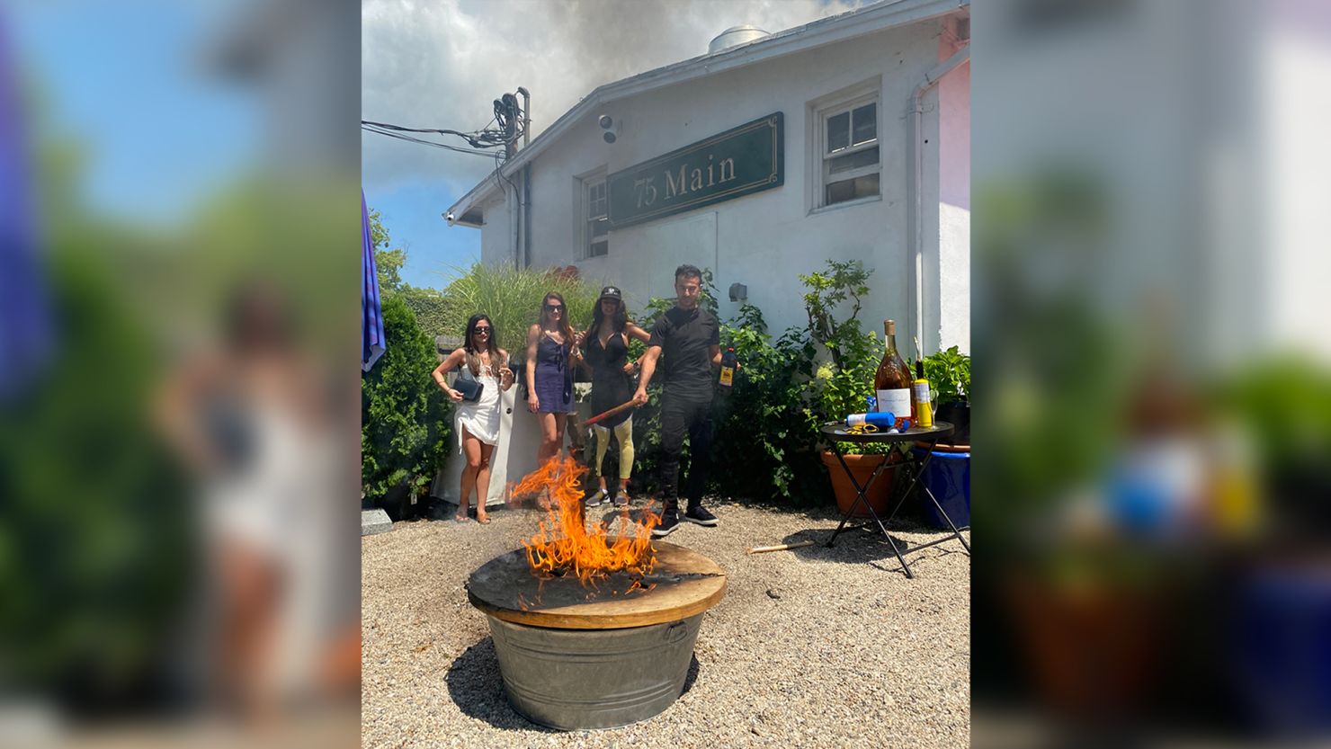 Zach Erdem, the owner of 75 Main in Southampton, lit the table that Jeffrey Epstein and Harvey Weinstein used to sit at on fire.