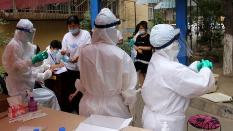 Residents undergo testing for the coronavirus on July 19 in Urumqi, China.
