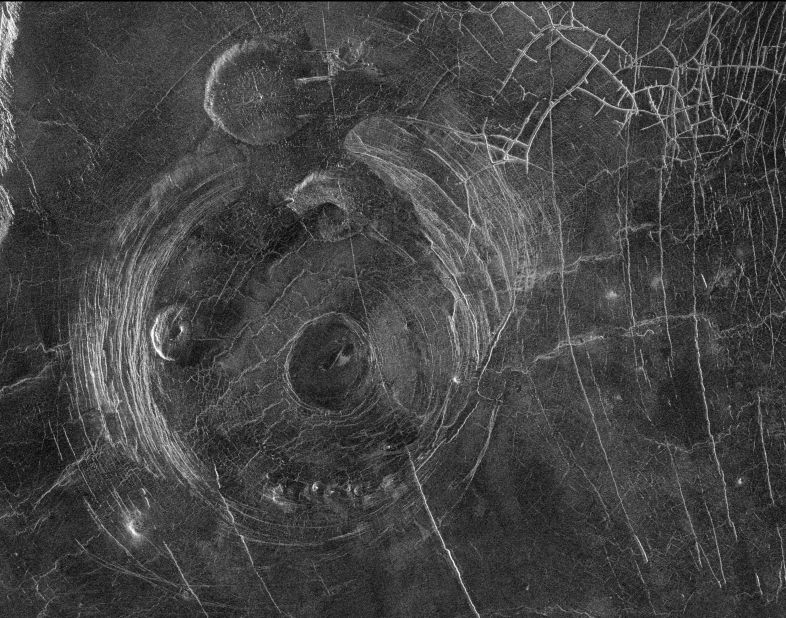 This radar image captured by NASA's Magellan mission to Venus in 1991 shows a corona, a large circular structure 120 miles in diameter, named Aine Corona. 