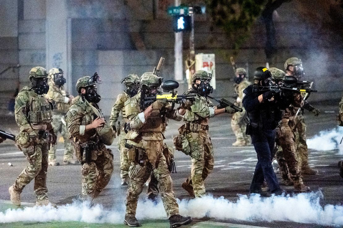 Federal agents use crowd control munitions to disperse Black Lives Matter protesters in the US city of Portland, Oregon, on July 20, 2020.