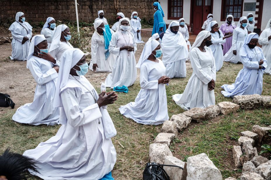 Worshippers of Legio Maria attend a prayer in Nairobi, Kenya, on July 19. Places of worship have reopened in Kenya under strict guidelines.