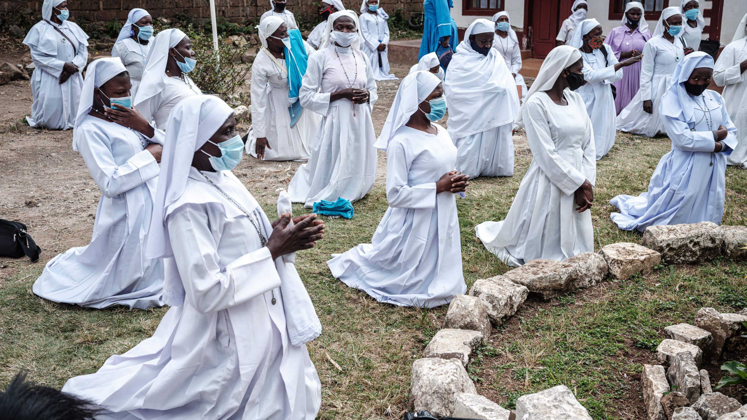 Worshippers of Legio Maria attend a prayer in Nairobi, Kenya, on July 19. Places of worship have reopened in Kenya under strict guidelines.