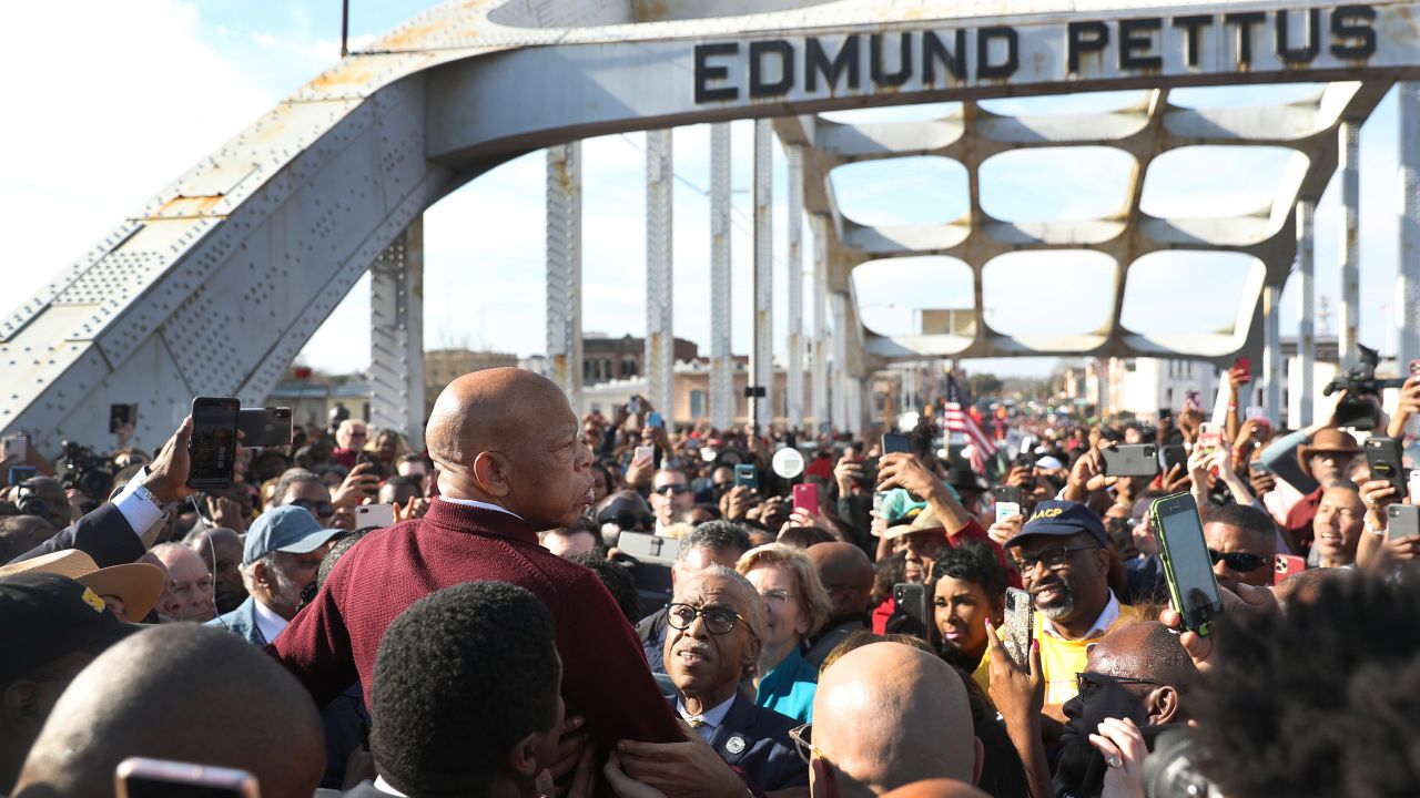 US Rep. John Lewis speaks to the crowd at the Edmund Pettus Bridge crossing reenactment on March 1, 2020, in Selma, Alabama. 