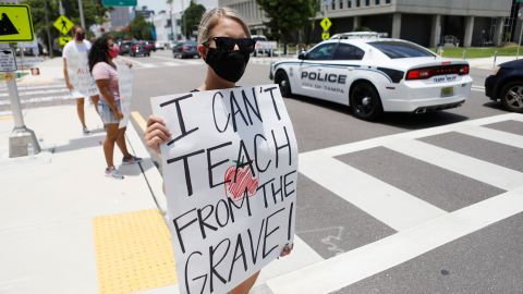 Middle-school teacher Brittany Myers takes part in a protest in July in front of the Hillsborough County Public Schools office in Tampa, Florida. 