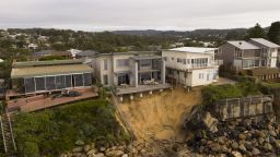 CENTRAL COAST, AUSTRALIA - JULY 17: An aerial view of the coastal erosion to local homes in the suburb of Wamberal on July 17, 2020 in Central Coast, Australia. Beachfront homes along the NSW Central Coast are at risk of collapse due to beach erosion after huge swells hit the states beaches on Thursday. (Photo by James D. Morgan/Getty Images)