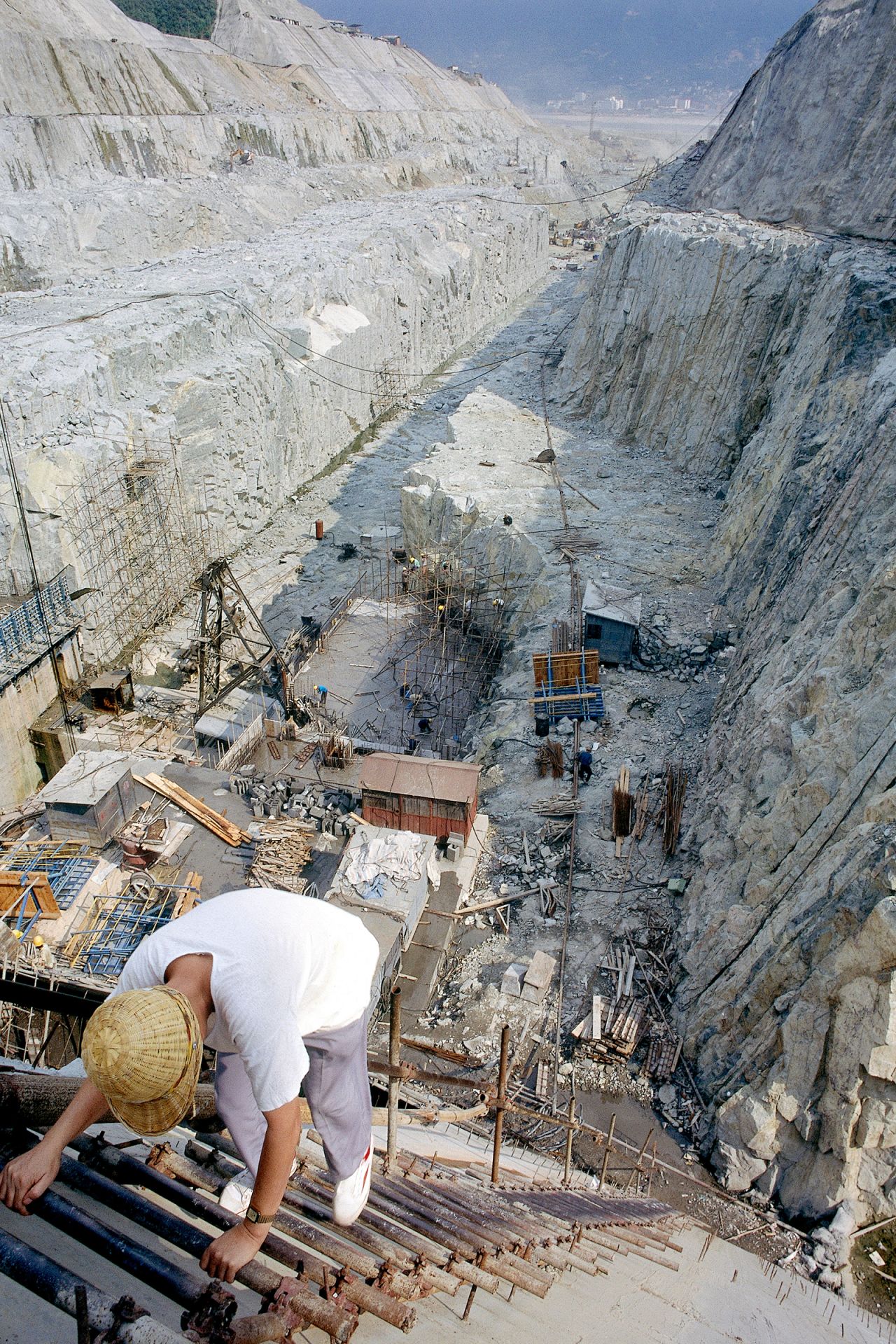 Rock excavation takes place for the dam's ship channel in 2000.