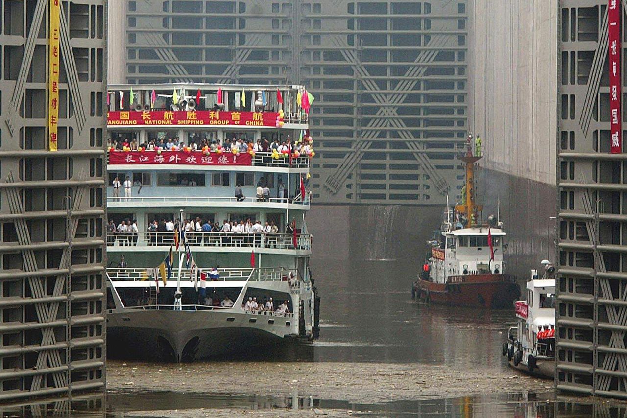 A passenger ship passes through the ship locks of the Three Gorges Dam on June 16, 2003.