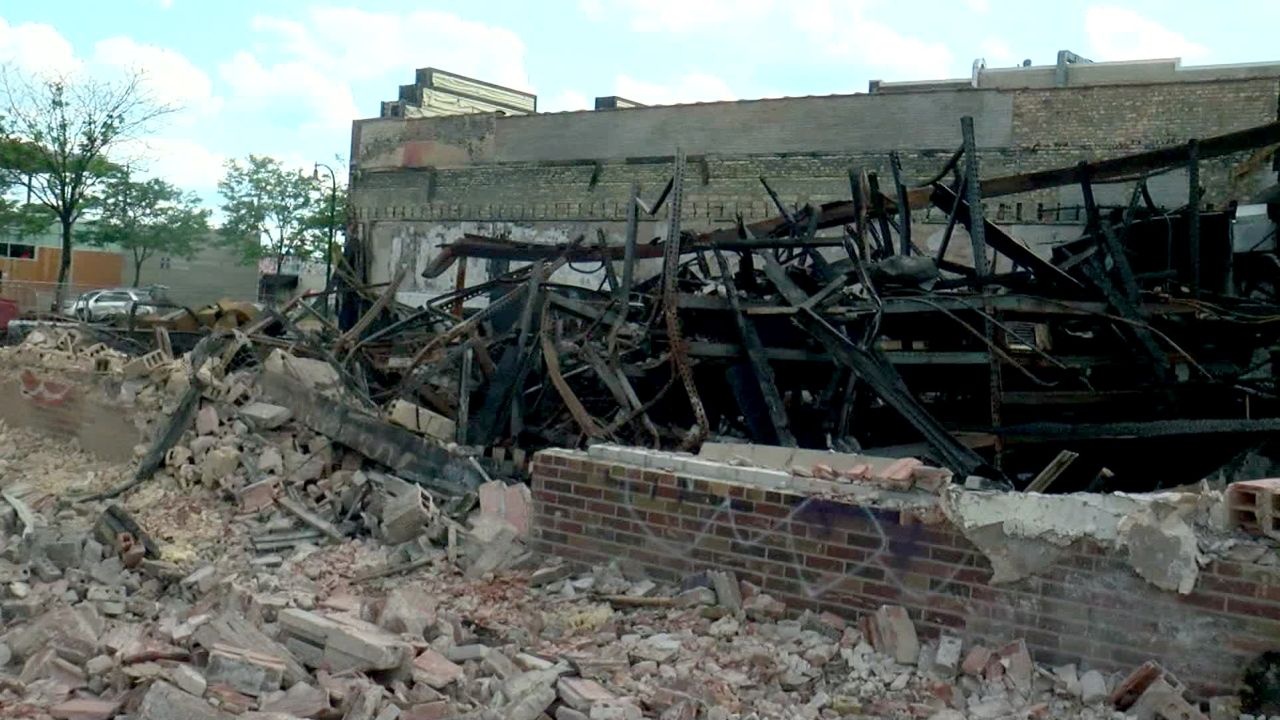 A body was discovered in the burned-out wreckage of Max It Pawn in Minneapolis, police said.