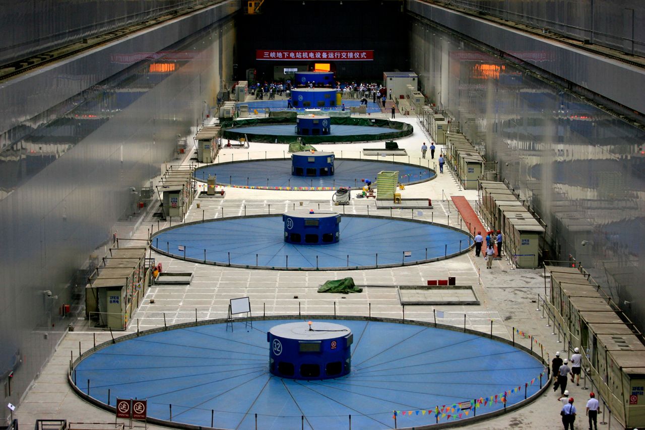 This picture taken on July 4, 2012 shows the last of the power generators being installed at the Three Gorges Dam's underground power station, allowing it to generate electricity at full capacity. 