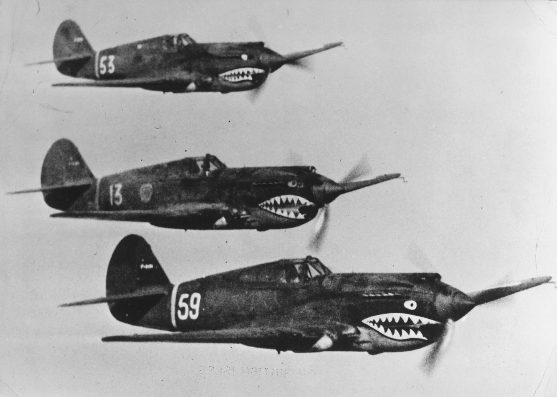 American Volunteer Group aircraft flying in tight formation during World War II.