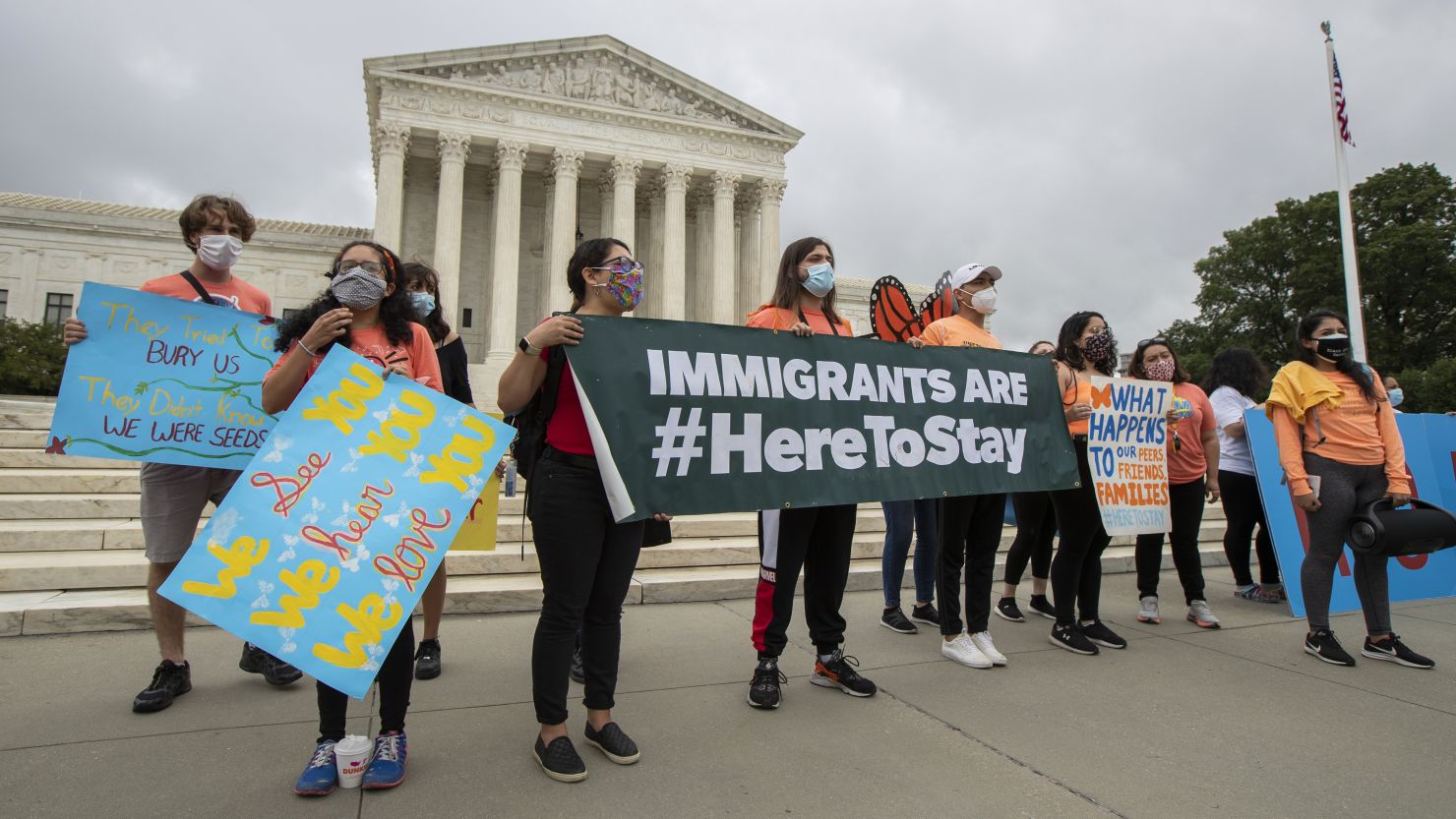 In this June 18, 2020, photo, Deferred Action for Childhood Arrivals students celebrate in front of the Supreme Court after the court rejected President Donald Trump's effort to end legal protections for young immigrants.