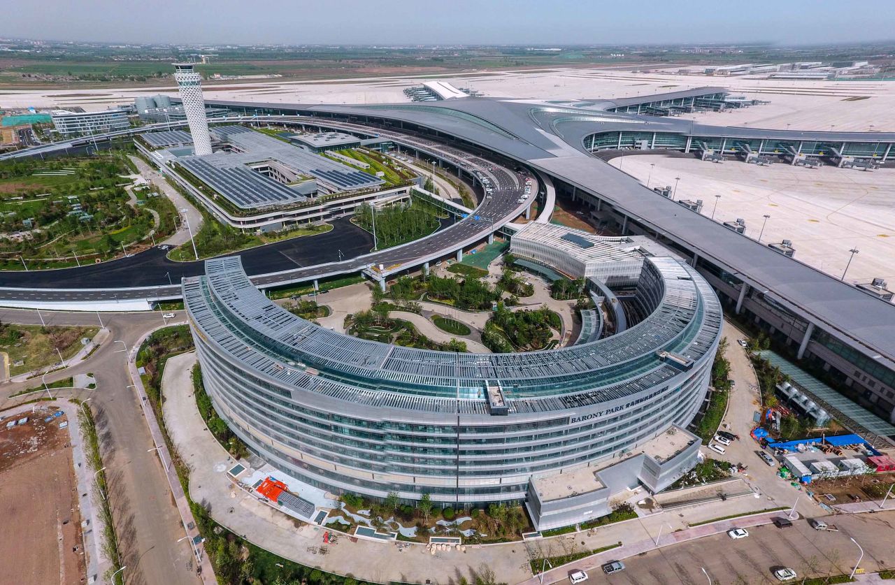Qingdao Jiaodong International Airport is topped by an ultra-thin stainless-steel roof. 
