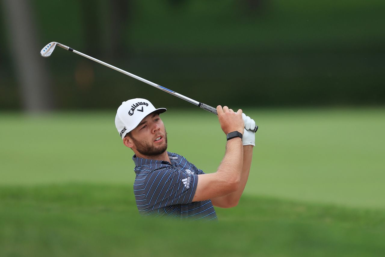 No. 8: American Sam Burns -- average 312.0 yards -- plays a shot from a bunker on the first hole during the final round of the Workday Charity Open on July 12, 2020 at Muirfield Village Golf Club in Dublin, Ohio.