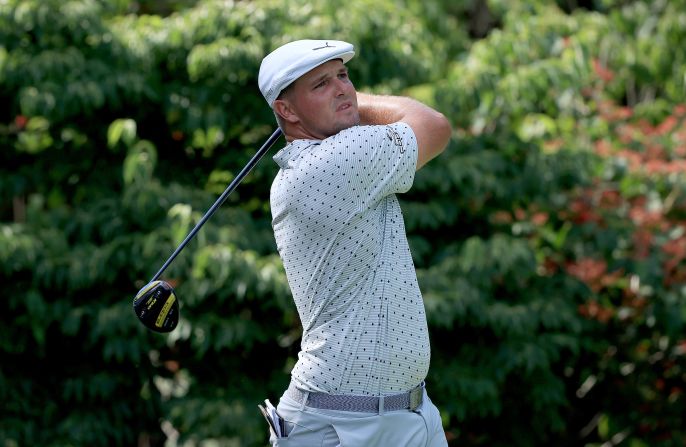 No. 1: <a href="index.php?page=&url=https%3A%2F%2Fwww.pgatour.com%2Fstats%2Fstat.101.html" target="_blank" target="_blank">According to PGA Tour statistics,</a> American Bryson DeChambeau is top of the off the tee driving distance rankings, averaging 325.0 yards. DeChambeau is pictured playing his shot from the 13th tee during the second round of The Memorial Tournament on July 17, 2020 at Muirfield Village Golf Club in Dublin, Ohio.