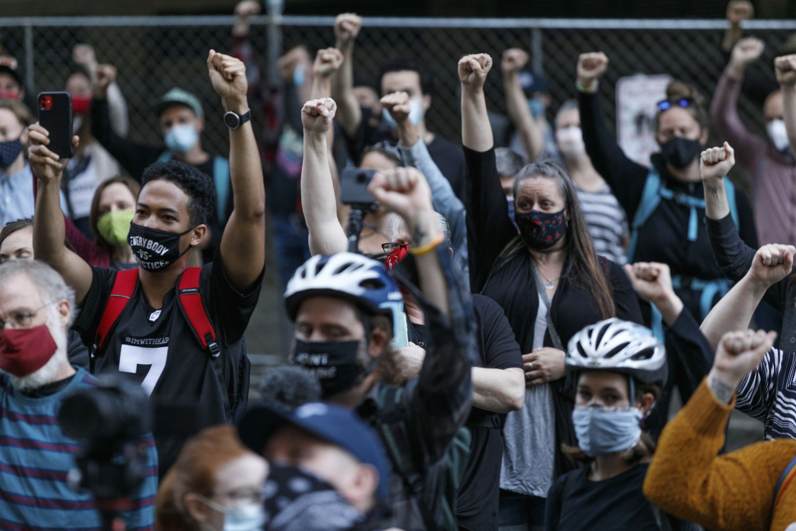 People join a rally at Portland's Justice Center on July 17.