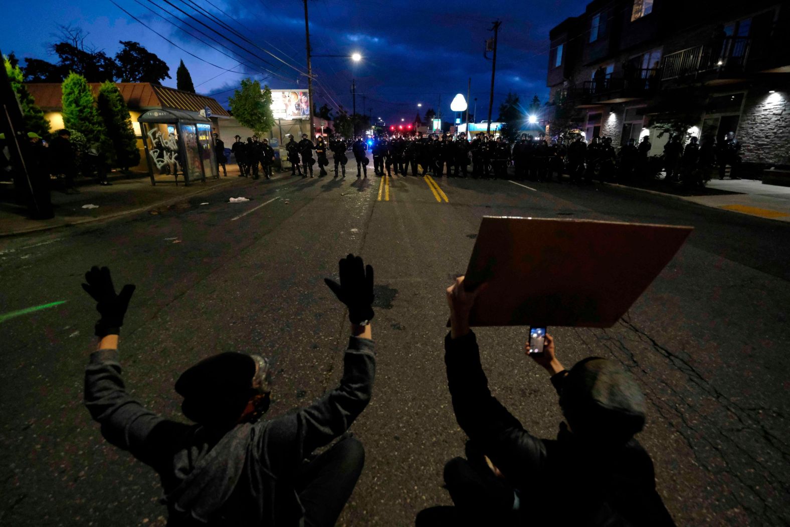 Protesters face off with police on June 30.