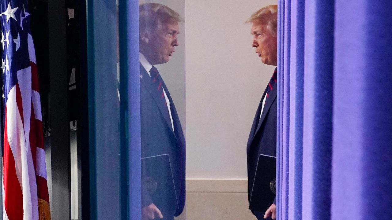 President Donald Trump arrives for a news conference at the White House, Tuesday, July 21, 2020, in Washington.