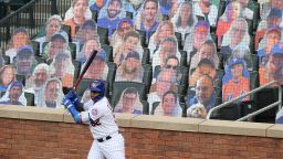 NEW YORK, NEW YORK - JULY 18:  Yoenis Cespedes #52 of the New York Mets stands in the on deck circle in front of cardboard fans during their Pre Season game at Citi Field on July 18, 2020 in New York City. (Photo by Al Bello/Getty Images)