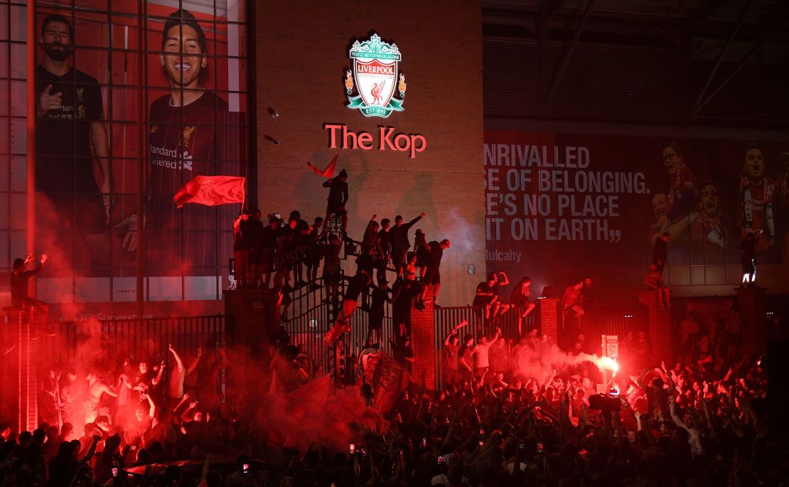 Fans celebrate Liverpool's Premier League title outside Anfield stadium in Liverpool last month.