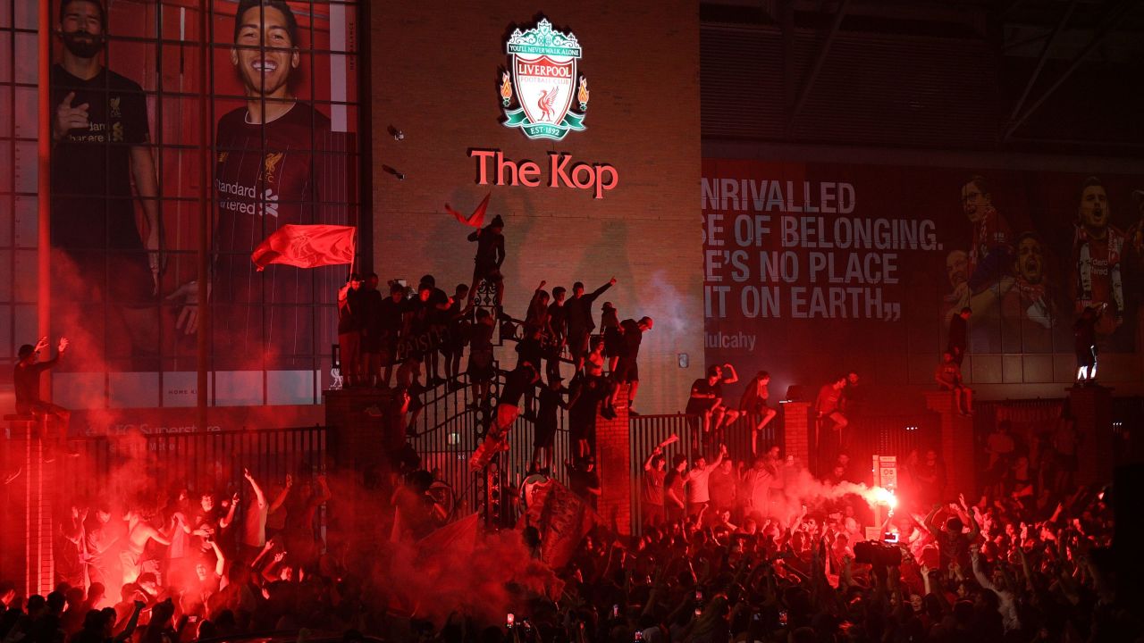 Fans celebrate Liverpool's Premier League title outside Anfield stadium in Liverpool last month.