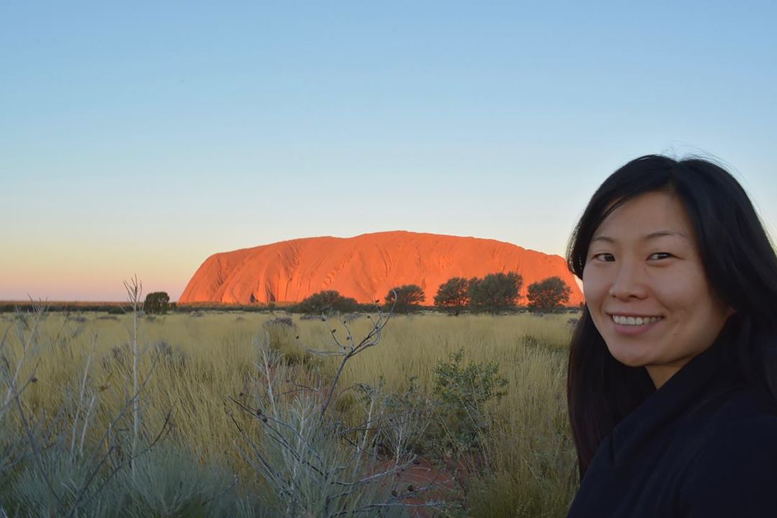Lianne Bronzo, a Korean American adoptee, is pictured on visit to Uluru, Australia. Because of Covid-19, Bronzo returned home to the United States after traveling for the past eight years.