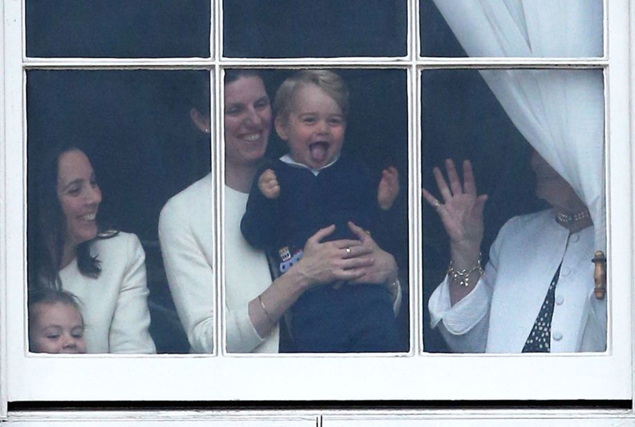 Prince George is held by his nanny, Maria Teresa Turrion Borrallo, during the Trooping the Colour ceremony in June 2015.