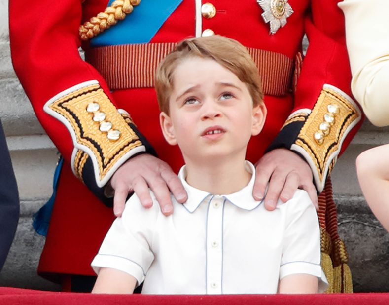 Prince George watches the Trooping the Colour parade from the balcony of Buckingham Palace in June 2019.