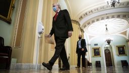 Senate Majority Leader Mitch McConnell, a Republican from Kentucky, wears a protective mask as he arrives to deliver opening floor remarks in the U.S. Capitol on July 22, 2020.