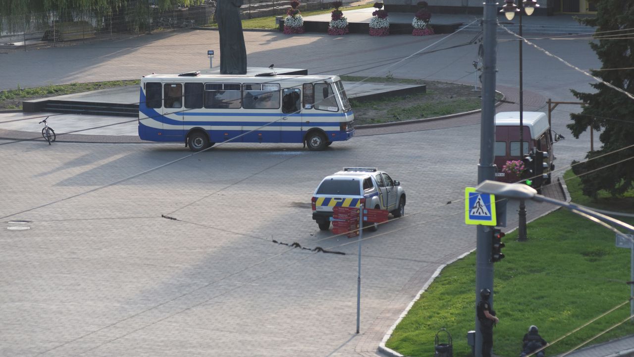 Police officers take up positions during an operation to rescue passengers on Tuesday.