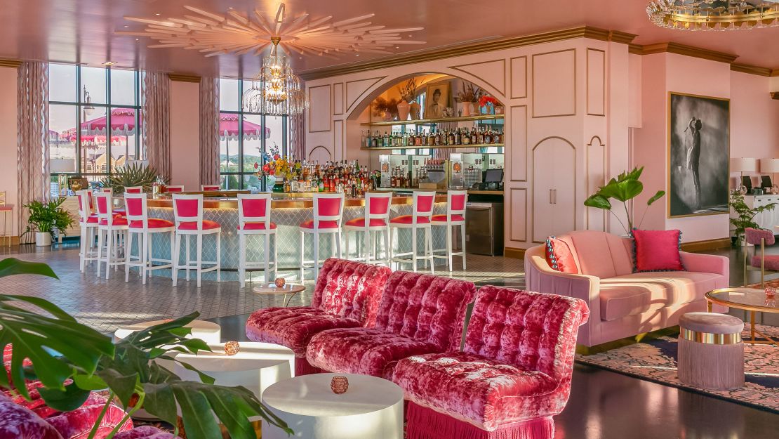 Pink walls, velvet lounges and a whimsical wrap-around bar help set the '80s Dolly vibe at White Limozeen in Nashville.