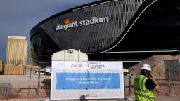 LAS VEGAS, NEVADA - APRIL 03:  A sign with guidelines for how to stay safe from the coronavirus is posted on a fence at Allegiant Stadium as construction continues on the USD 2 billion, glass-domed future home of the Las Vegas Raiders on April 3, 2020 in Las Vegas, Nevada. The Raiders and the UNLV Rebels football teams are scheduled to begin play at the 65,000-seat facility in their 2020 seasons. On Friday, Las Vegas Raiders owner and managing general partner Mark Davis pledged USD 1 million to fight the coronavirus in Las Vegas. The World Health Organization declared the coronavirus (COVID-19) a global pandemic on March 11th.  (Photo by Ethan Miller/Getty Images)