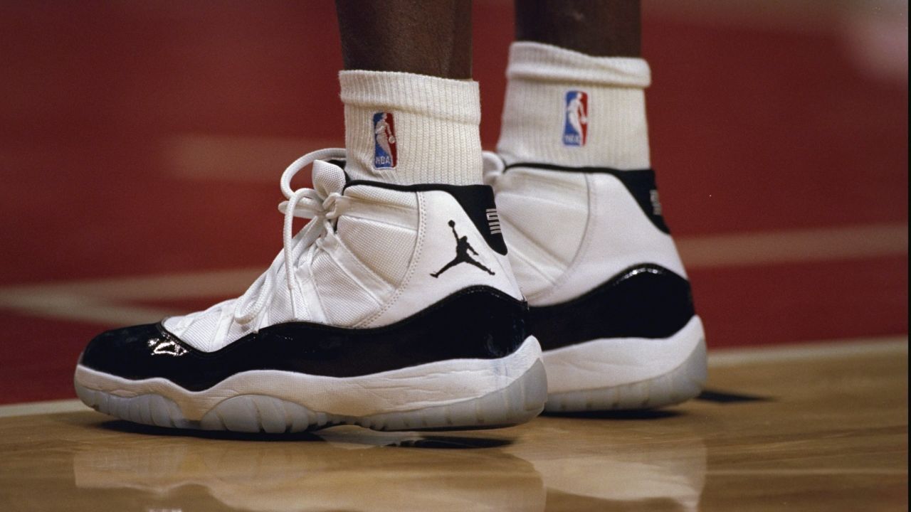 The "Concord" Air Jordan 11s were inspired by Jordan's desire to have a sneaker that worked on the court as well as for formal occasions. Designer Tinker Hatfield included patent leather in the design and an icy blue outsole.