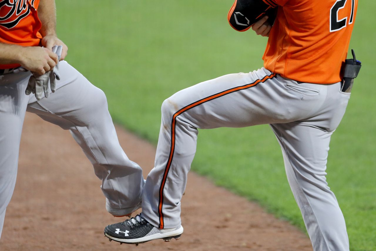 Baltimore's Chris Davis, left, and Austin Hays tap feet after Hays hit a home run during training on July 8.