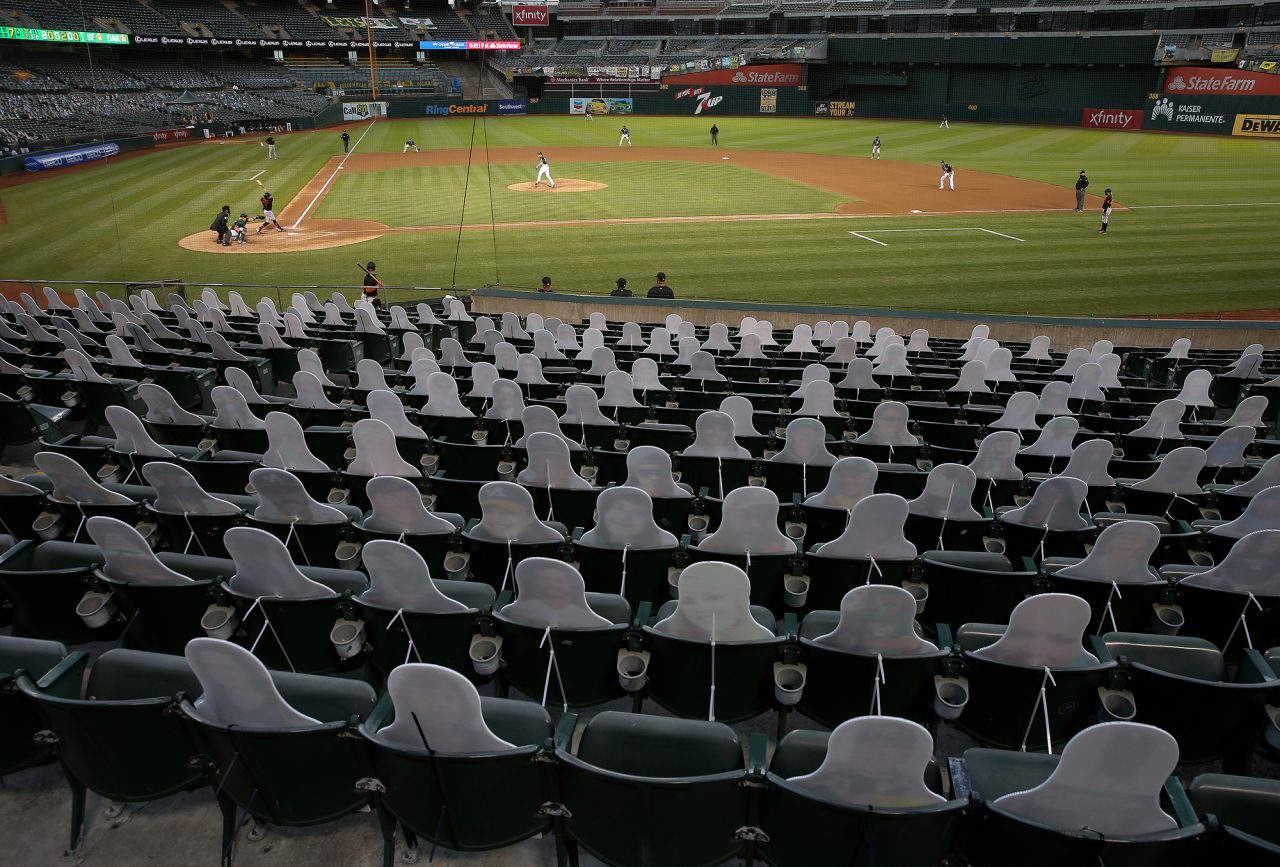 Fan cutouts are seen at the Oakland Coliseum as the Oakland Athletics play the San Francisco Giants in an exhibition game on July 20.