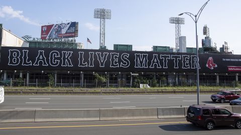 The phrase "Black Lives Matter" -- written in the Red Sox team's font -- has been placed on the massive billboard that runs alongside the Massachusetts Turnpike by Fenway Park. 