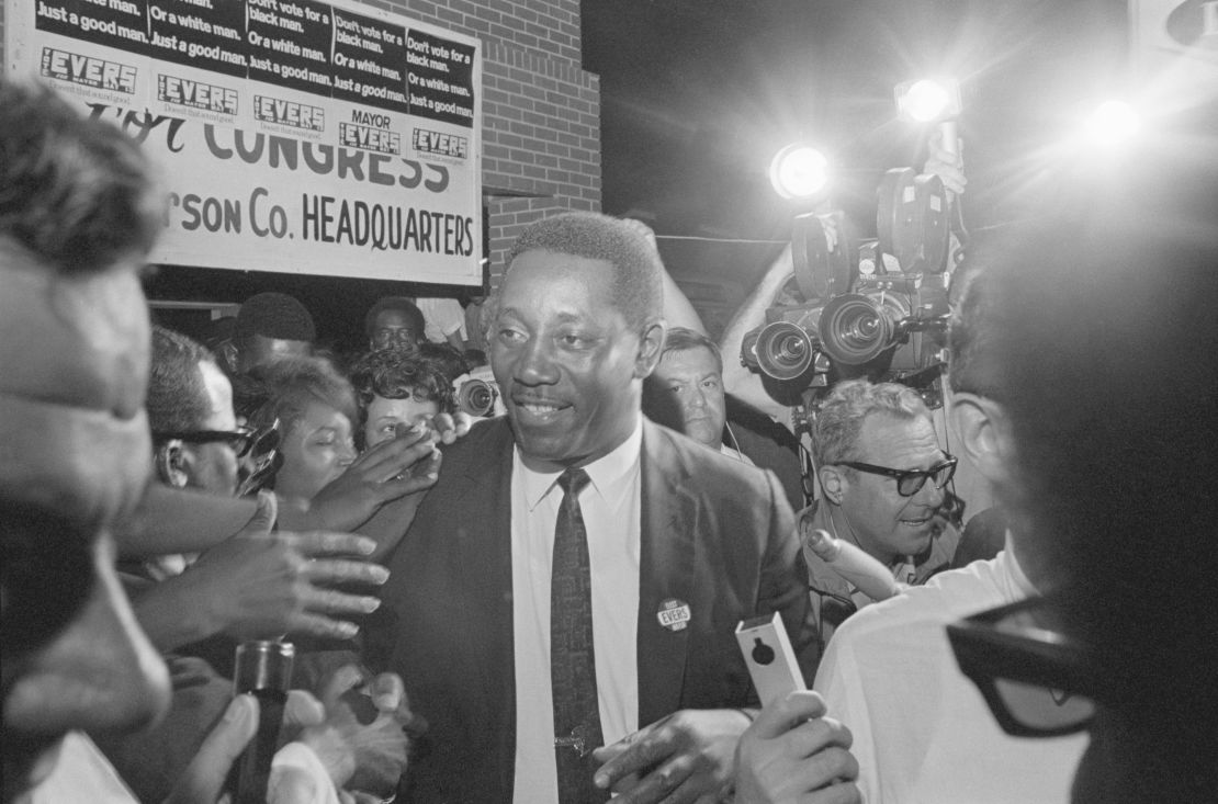 Charles Evers is cheered outside his campaign headquarters after he was elected mayor of Fayette, Mississippi, in 1969.