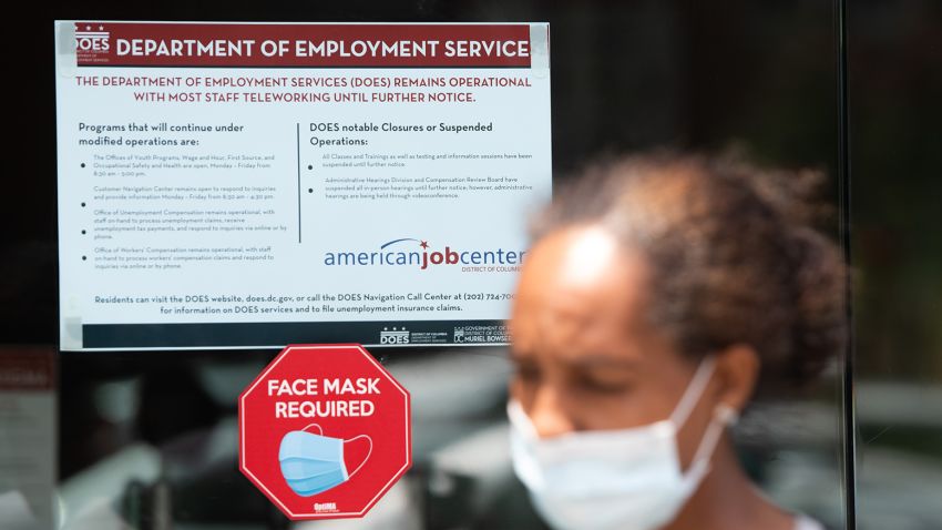 Diana Yitbarek, 44, of Washington, DC, leaves the DC Department of Employment Services, after trying to find out about her unemployment benefits in Washington, DC, July 16, 2020. - Americans worry as unemployment benefits are due to end soon. (Photo by SAUL LOEB / AFP) (Photo by SAUL LOEB/AFP via Getty Images)