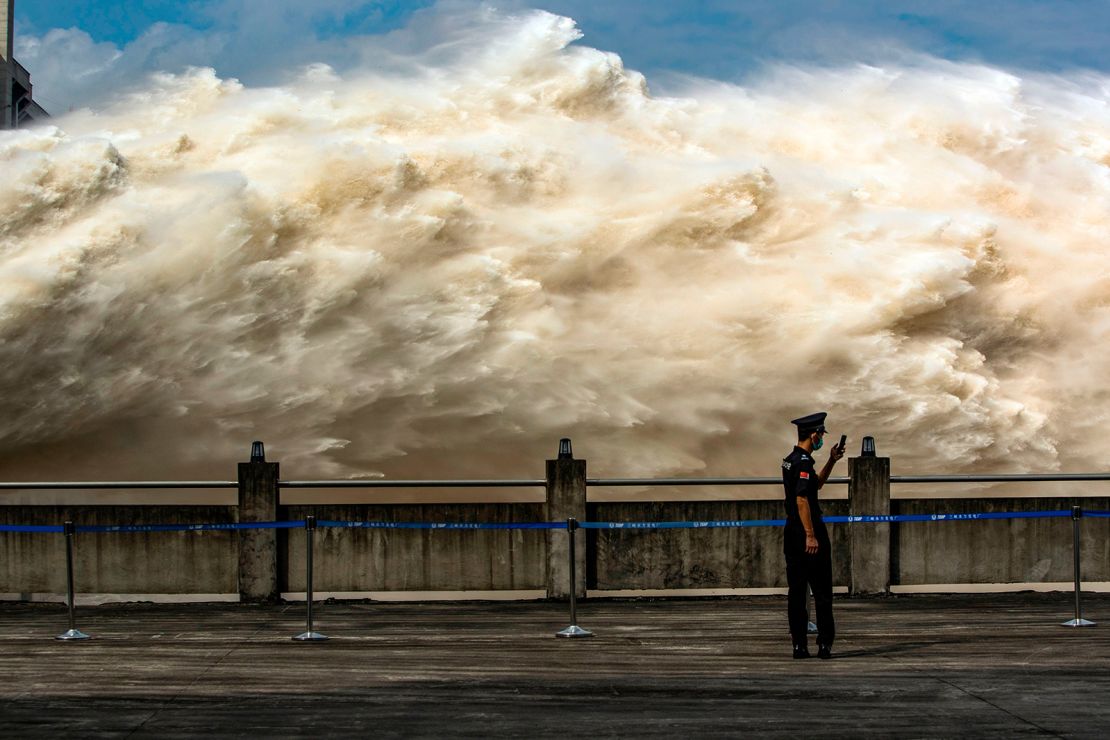 Water is released from the Three Gorges Dam to relieve flood pressure in Yichang, central China's Hubei province on July 19, 2020.