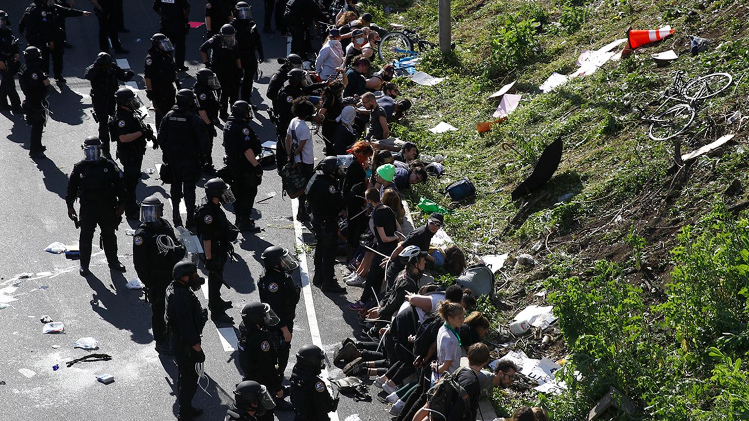 Police detain protesters in the aftermath of a march calling for justice over the death of George Floyd on Interstate 676 in Philadelphia.