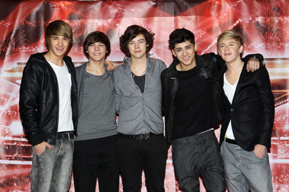 One Direction pose for a photocall to promote "The X Factor" final held  December 9, 2010 in London.