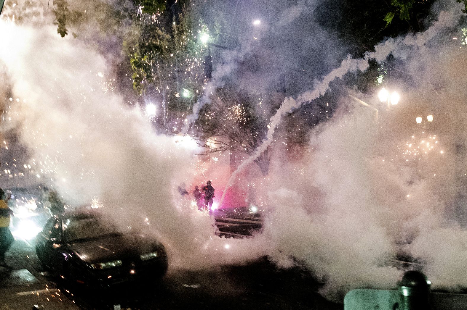 Smoke fills the area as federal officers try to disperse protesters on July 22.