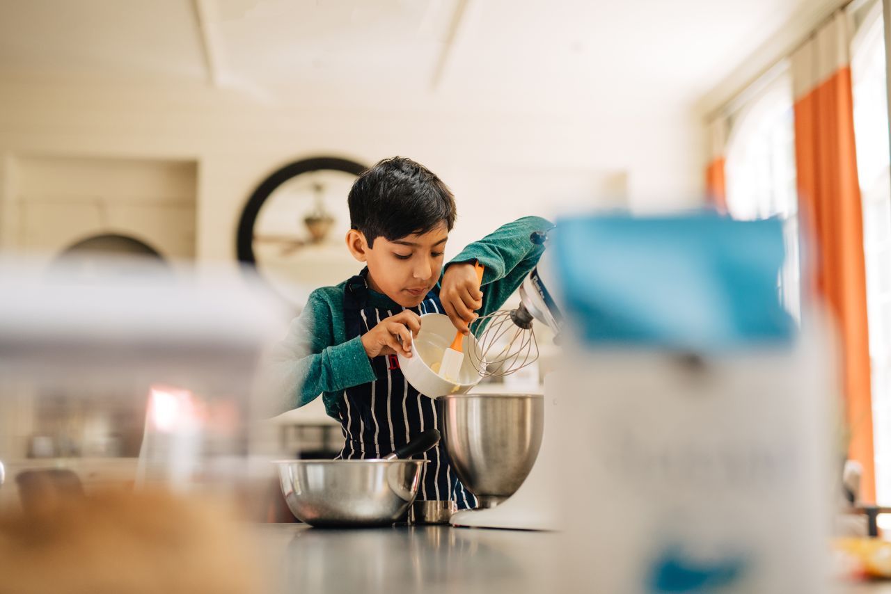 "I like cooking better than sports. In sports, you can't change up the rules. You have to dribble the ball or pass the ball a certain way. But with recipes, you can change them up and still have something great to eat." -- Rohaan, age 9. <em>Gallery photos excerpted from "The Heart of a Boy: Celebrating the Strength and Spirit of Boyhood." Copyright © 2019.</em>