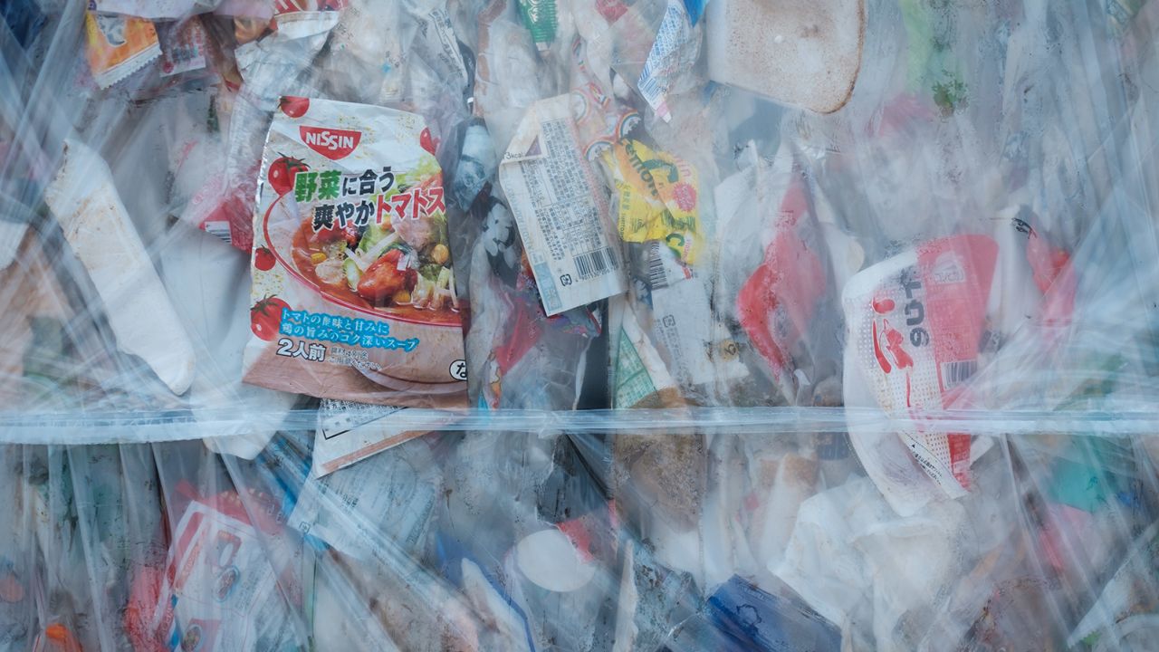Compressed plastic waste at Ichikawa Kankyo Engineering, a recycling center in Japan.