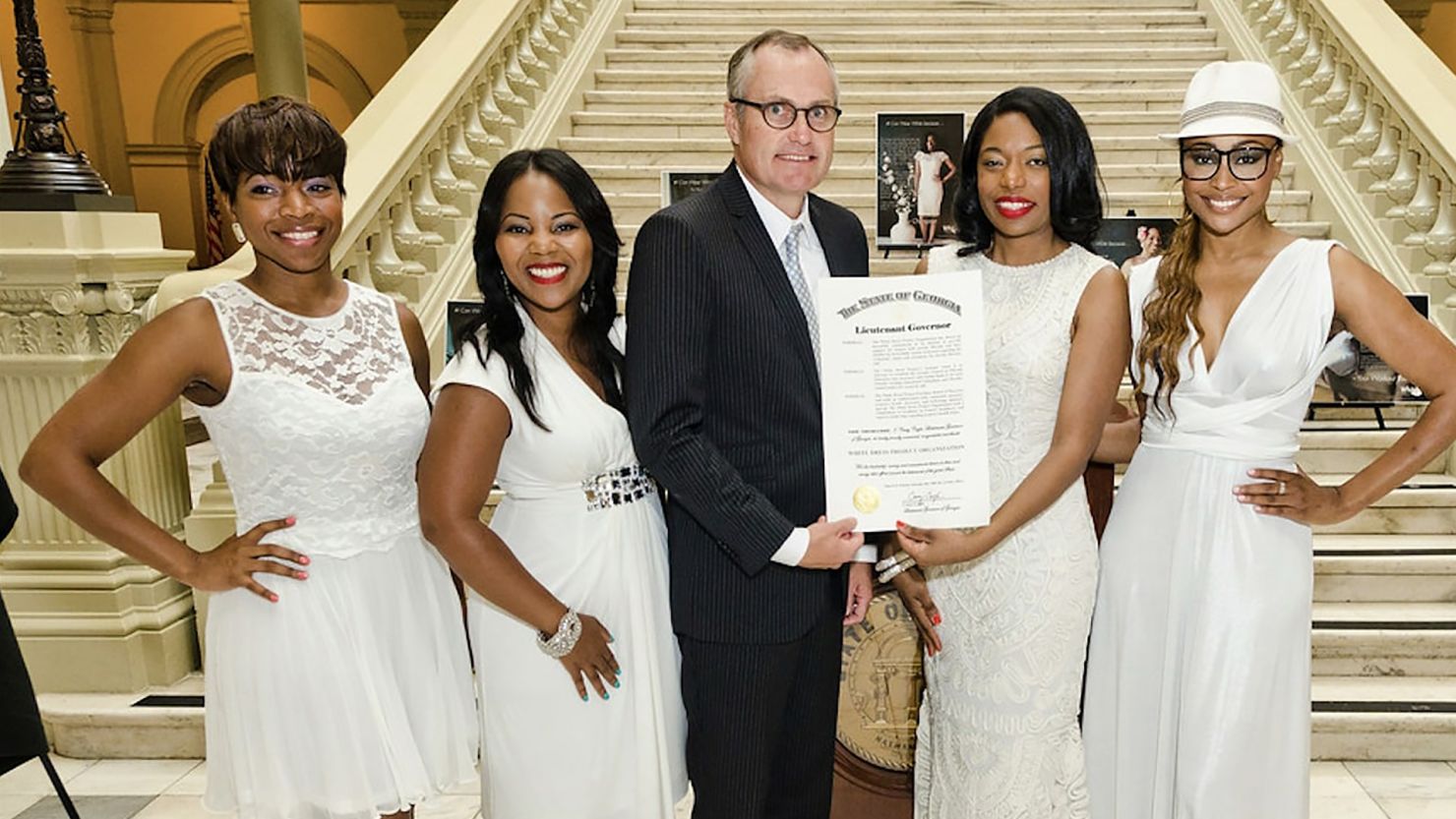 Tanika Gray receiving the Georgia resolution in 2014 declaring July Fibroid Awareness Month.